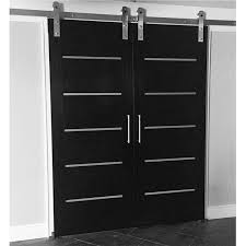 Black And White Barn Door This Modern Black Sliding Door Is Sleek And Amazing Love The Grey Details In The Paneled Door Shed Door Hardware Barn Door Modern Barn Door
