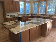 The idea of a kitchen where everything matches is a thing of the past. 11 Patagonia Granite With Wood Cabinets Ideas Granite Kitchen Granite Wood Cabinets