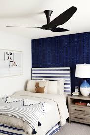 Boys simple bedroom with small bed and toys. This Stylish Blue Striped Boy S Bedroom Is Kid Goals