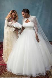 The star looked gorgeous in a white strapless versace dress that featured lace and feathers throughout the bodice. Trois Generations Serena Williams Wedding Wedding Dresses Serena Williams