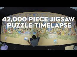 The lego art world map appears to be more than a simple jigsaw puzzle. Watch The World S Largest Jigsaw Puzzle Come Together Nerdist