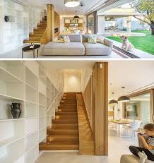 A Built In Slide Makes The Wood Stairs In This House Fun For Kids Maison Escalier Bois Maison Bois