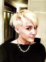 And in another photo, the plastic hearts star rocks a black leotard. New Short Blonde Hairstyle For Miley Cyrus Hair Romance