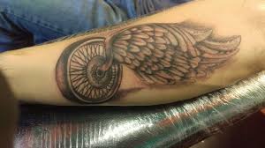 Winged Wheel Motorcycle Charm Tattoos For Guys Body Tattoos Biker Tattoos