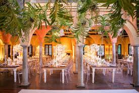 Behind ribbons of rusted steel. Greek Wedding Hanging Orchid Ceiling Orchid Roof Suspended Orchid Ceiling With White Orchid Mass Arrangements Hanging Flowers Wedding Hanging Orchid Orchids