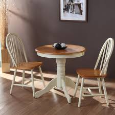 Astonishing White Pedestal Round Dining Table And 2 Windsor Dining Chairs On Laminate Wo Round Dining Table Small Wooden Table And Chairs Windsor Dining Chairs