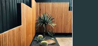 The traditional wood picket fence is painted in several colors and match with the colors of plantations and flowers around. Do S And Don Ts For Choosing The Right Fence Colour Maria Killam