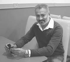 Local designer custom- makes dollhouse