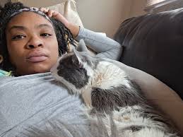 Albino raccoon with distinctive facial features