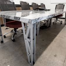 Using Quartz For Your Conference Table Top Creates A Sleek Design Conference Table Sleek Design Living Spaces