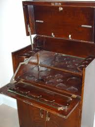 I had the corks and the paint, so they were free. Liquor Storage Cabinet Antique Appraisal Instappraisal