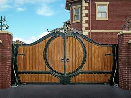 As with metal gates, wooden garden gates can be bought off the shelf at any number off online and high street retailers. Wooden Driveway Gates Wood Clad Inserts With Iron Frames