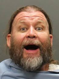 Man accused of making threat during protest at Sen. Flake's Tucson office