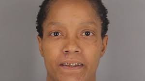 Woman charged with murder in man's shooting death