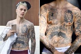 Just a few weeks after welcoming his second child with brittany bell, cannon was spotted with model lanisha cole. All Of Justin Bieber S Tattoos And Their Meanings