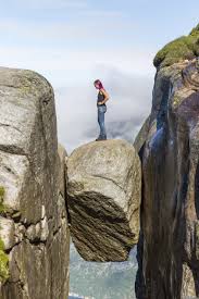 The rock is over 3,280 feet (1,000 metres) high and offers a. Kjeragbolten A Stone Pea Hanging Above The Abyss Norway Blog About Interesting Places
