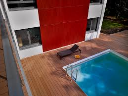 The area that surrounds your swimming pool is called a pool deck. Composite Decking