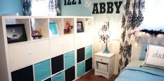 Choose visual dividers that separate the space, but that don't block sunlight or cut up the square footage of an already tiny home. How One Mom Divided 1 Room Into 2 Bedrooms For Her Daughters Without Building A Wall Kids Room Divider Room Divider Ideas Bedroom Sibling Room