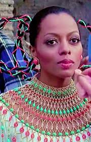 Diana is wearing one of her Mahogany creations. Such intricate detailing!