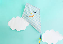 Tie a loose string to both sides of the horizontal stick How To Make Your Own Kite Step By Step Instructions Lunch Lady Magazine