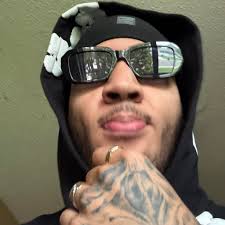 Kash Doll receives backlash for wiping her nose with a $20 bill at a NBA  game