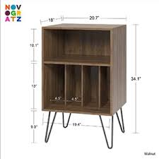 And the large cubby will hold 25 lbs. Novogratz Concord Turntable Stand Double Walnut