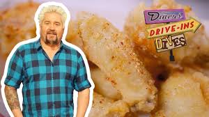 Guy Fieri Eats Szechuan Parmesan Garlic Wings Diners Drive Ins And Dives Food Network Youtube