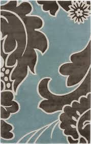 You can see in the rug below a traditional pattern in transitional tones. Millennium 4655a Rug Floral Rug Area Rugs Brown Area Rugs