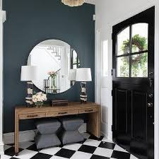 We love this idea especially for when foyers or entryways flow into mudrooms. Tiled Entryway Floor Design Ideas