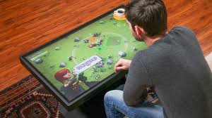 Lift top coffee table is a beautiful and practical table that is designed with a lift top, which can be easily lifted up to have a suitable and comfortable height to use a laptop, write or dine while relaxing on the couch. This Huge Coffee Table Can Switch Between Android And Windows No Joke