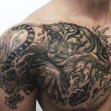 Chest Tattoos Askideas Com In 2021 Tiger Tattoo Sleeve Tiger Tattoo Chest Tattoos For Women
