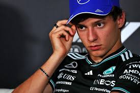 Button goes viral with awkward Danica Patrick moment live