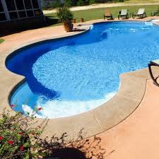 The backyard pool designs featured in this collection have a wide range of style in their design. Pools By Design Home Facebook
