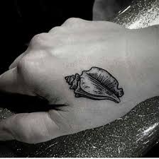 3 awesome shell tattoo inspirational designs and ideas. Magic Conch Shell Shell Tattoos Conch Shell Tattoos Around Arm Tattoo