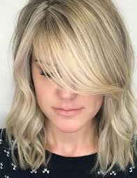 It is simple yet an elgant look which is enough to sweep all the. 20 Hairstyles With Side Swept Bangs That Will Sweep You Off Your Feet