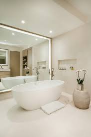 Bathroom mirror framed crown molding hometalk. Big Bathroom Mirror Trend In Real Interiors