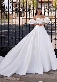 From short wedding dresses to dramatic ball gowns, we promise your dhgate wedding gown will be the most spectacular dress you have ever worn. Pronovias Ixion Fairytale Princess Wedding Dress With Puff Sleeves Designer Bridal Room