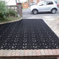 How to build a driveway apron. How To Lay Plastic Grids For Gravel Driveways Dengarden