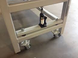 Retractable Wheels Hydraulic Jack Pushes Crosspiece Down Table Up Compressing The Springs Between Cro Heavy Duty Work Bench Welding Table Woodworking Tools Uk