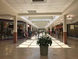 Shopping center, variety of stores and businesses housed within a series of connected buildings or within a single building; Coventry Mall Shopping Mall In Pottstown Pennsylvania