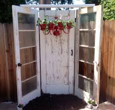 Thank You Pinterest For The Ideas I Found The Two Side Doors At A Barn Sale For 5 Each And The Middle Doo Backyard Garden Backyard Garden Design Garden Wall