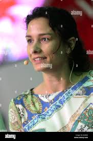 Translater Raquel Rosa attends a press conference of the German national  soccer team in Brazil, 12 June 2014. The FIFA World Cup 2014 will take  place in Brazil from 12 June to