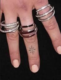 You are instantly resurrected but left vulnerable and without combat defences. Dua Lipa S 18 Tattoos And How She Got Them What Stars Own