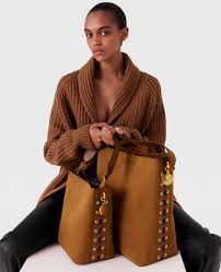 NWT COACH recognized Mini Rowan