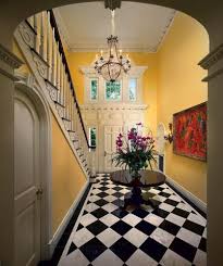 See more of this home here. Elegant Foyer Black White Marble Tile The Glam Pad