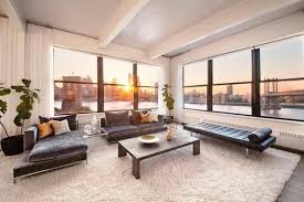 The building's amenities include a laundry and a gym. If At First You Don T Succeed Anne Hathaway Sells Dumbo Clocktower Loft The Second Time Around 6sqft