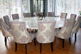 This extra large round dining table can comforatbly seat 12 when opened and is a heavy and dense table with smooth operating leaves. 12 Person Dining Table You Ll Love In 2021 Visualhunt