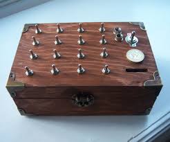 He first created his designs as bizarre, intricately designed music boxes, as he was well known as a maker of mechanical singing birds. The Enigma Puzzle Box Puzzle Box Escape Room Puzzles Wooden Puzzle Box