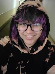 Just a girl in her softest hoodie, taking a moment to be happy