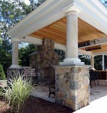 Backyard concrete paver patio ideas. Outdoor Fireplace And Covered Patio The Modern New England Home Via Houzz New England Homes Outdoor Fireplace Outdoor